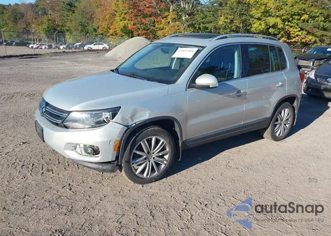2014 Volkswagen Tiguan Sel из США, поврежденный, VIN WVGBV3AX1EW591852